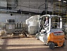 Разгрузка и перемещение оборудования, такелажные и монтажно-сборочные работы при строительстве нового завода